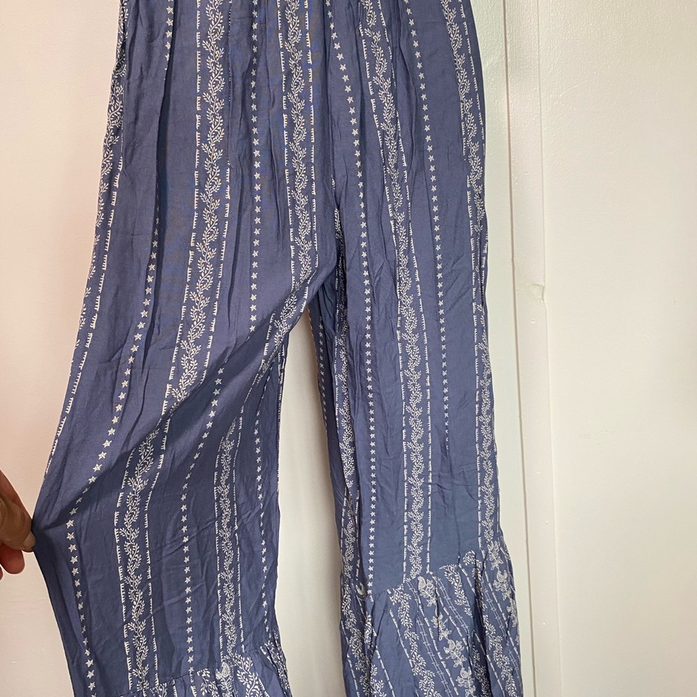 Blue Strapless Jumpsuit With Patterned Details - image 6